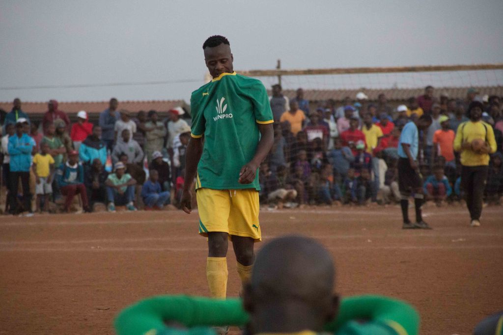 A player from Wenpro FC walks back to his team after missing a penalty, played for the Emmanuel ‘Scara’ Ngobese Memorial Soccer Tournament 2015 at the Somholo Grounds, in Katlehong, Ekurhuleni, on 05 July 2015. © JABULILE PEARL HLANZE