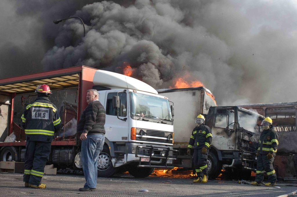 Three buses and two trucks were affected by a large fire at a bus depot in Fordsburg on Albertina Sisulu Road. Johannesburg Emergency Management Services at the scene extinguished the fire and no foul play was suspected as the cause of the fire. 26 June 2015‬ © Jabulile Pearl Hlanze
