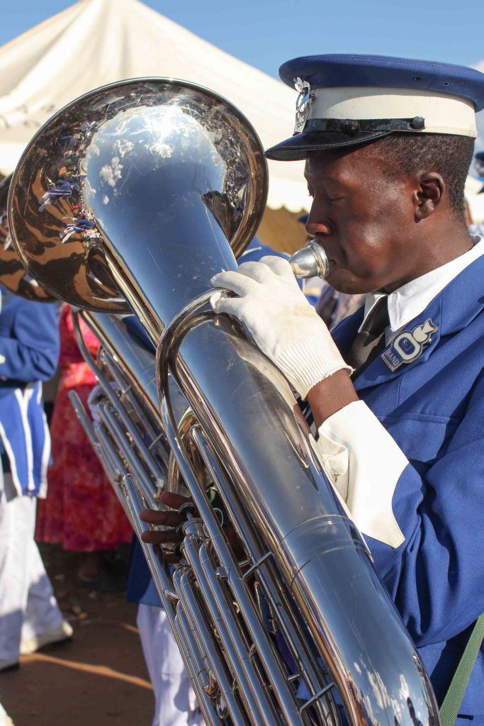 SOUTH AFRICA: A member of the Ntate Masango St. John Apostolic Faith Mission Church plays the trumpet as part of the closing ceremony for the Easter Weekend celebrations. © JABULILE PEARL HLANZE