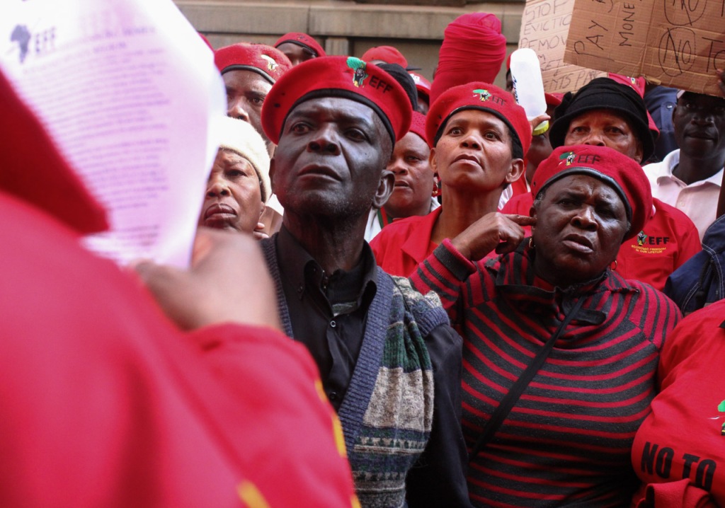 SOUTH AFRICA: EFF members matched to the Gauteng Government Offices in Simmonds Street to drop off a memorandum. They warned that there wil be chaos if Premier David Makhura doesn't accede to its demands for subsidised basic services and improved service delivery. 22 July 2015. © JABULILE PEARL HLANZE
